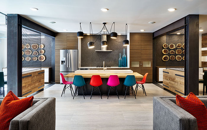 Industrial home decor including bright colored bar stools