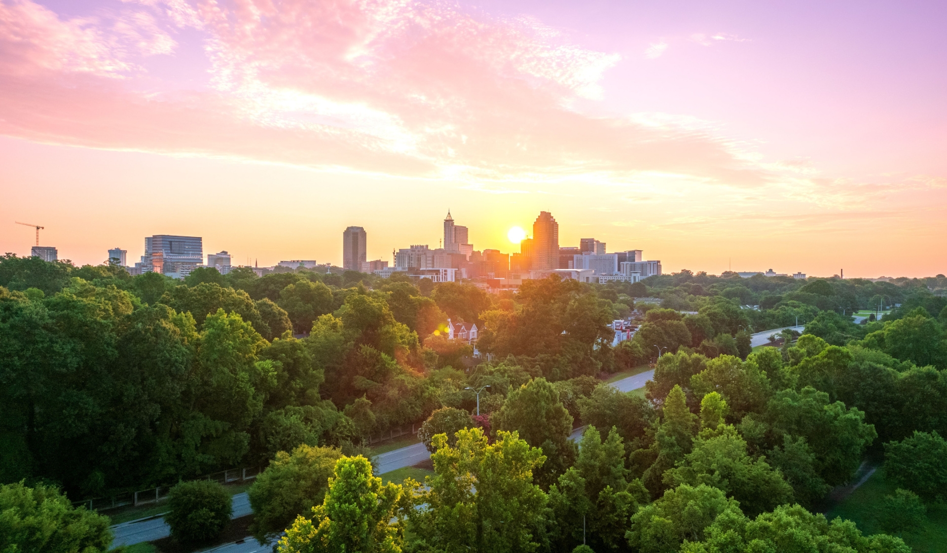 skyline of downtown Raleigh at sunset